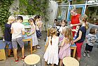 Kinder an Forschertischen zum Tag der klienen Forscher 2018 in München